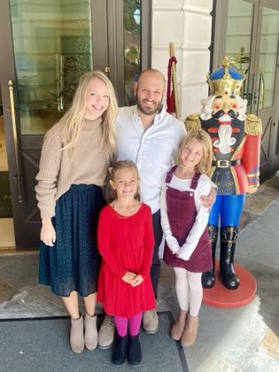 Brian with his wife and two daughters in Charleston
